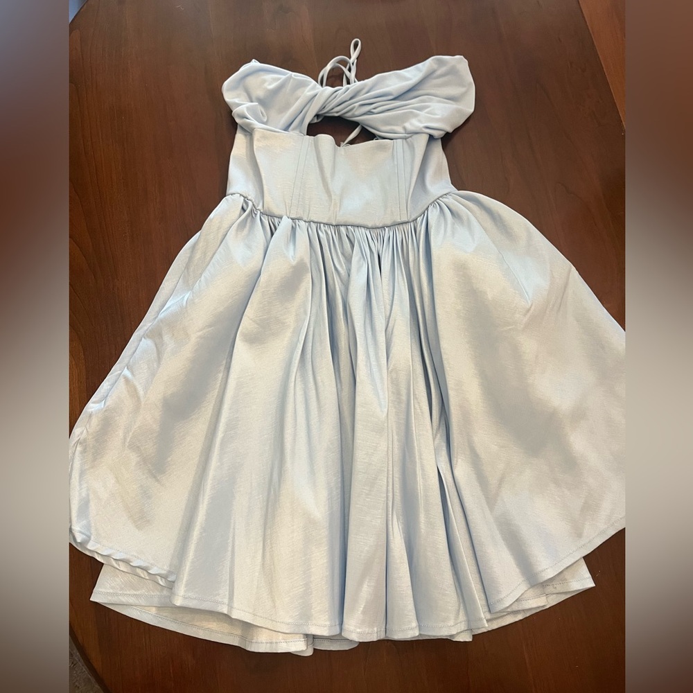 Lucy in the sky homecoming dress. New and never worn. Size small. Light blue.